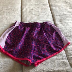 Child large(10-12) pink and purple action shorts
